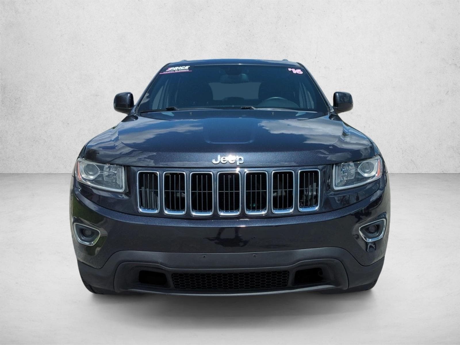 Used 2016 Jeep Grand Cherokee Laredo E with VIN 1C4RJEAG5GC422576 for sale in Winter Park, FL