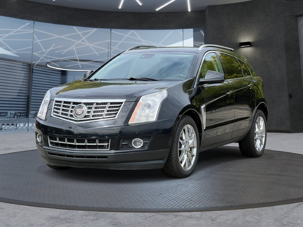 Used 2013 Cadillac SRX Premium Collection with VIN 3GYFNJE37DS598391 for sale in Grand Rapids, MI