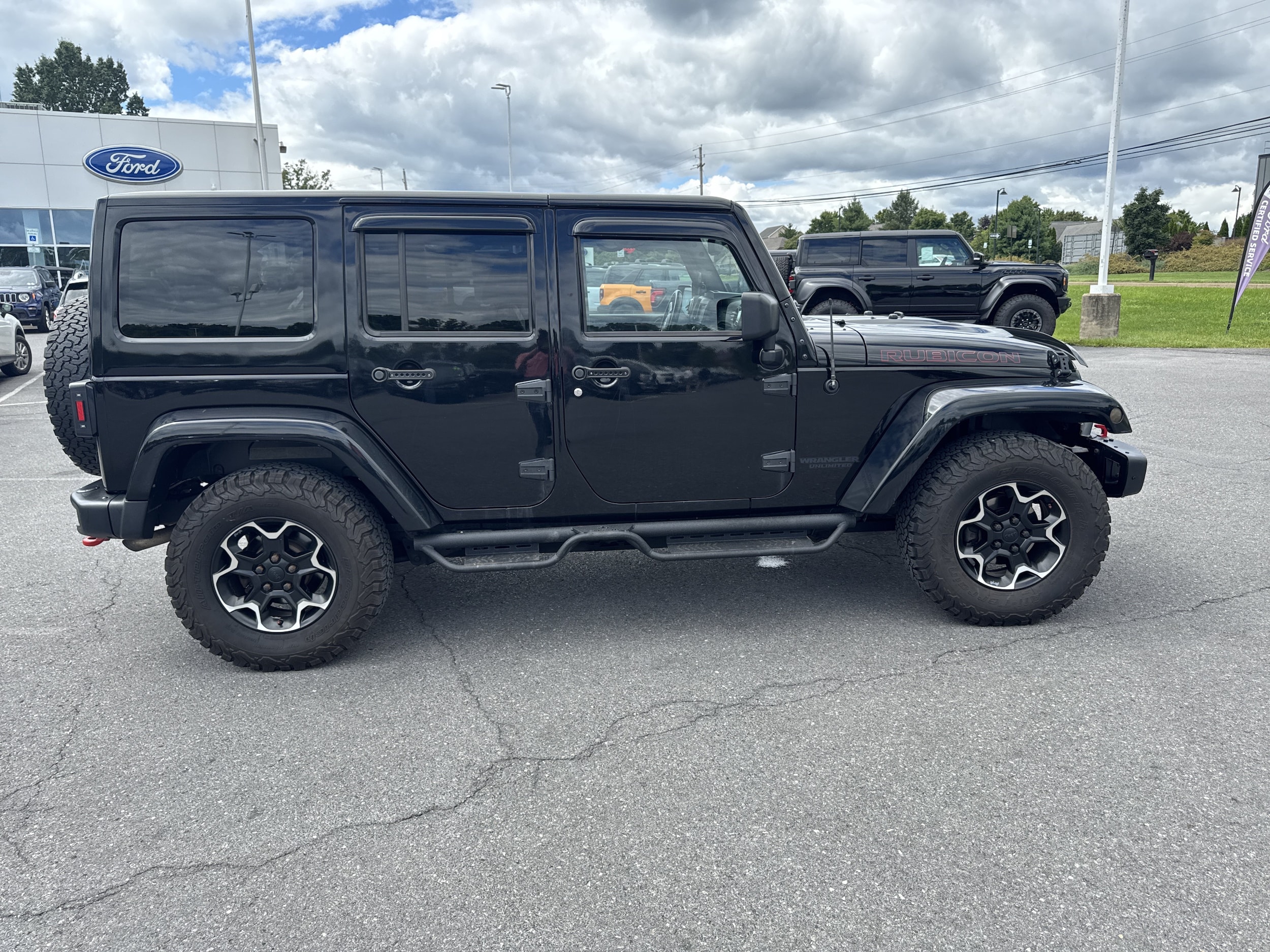 Used 2015 Jeep Wrangler Unlimited Rubicon with VIN 1C4HJWFG7FL587425 for sale in Lewisburg, PA