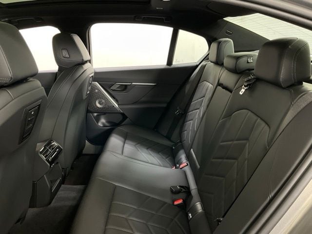 2026 BMW 5 Series 550e - Photo 36