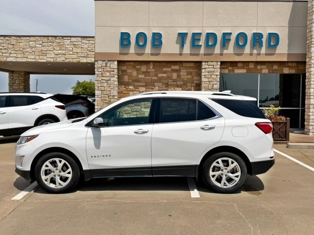 Used 2021 Chevrolet Equinox Premier with VIN 3GNAXNEV3MS103985 for sale in Farmersville, TX