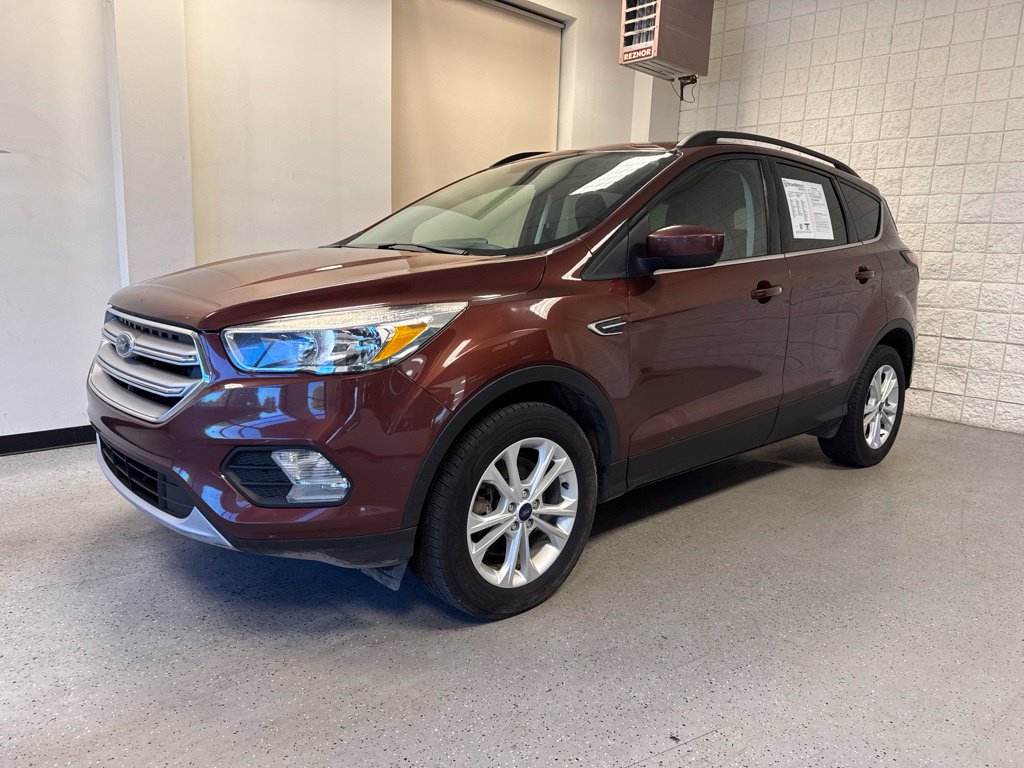 Used 2018 Ford Escape SE with VIN 1FMCU9GD8JUC36674 for sale in Petoskey, MI