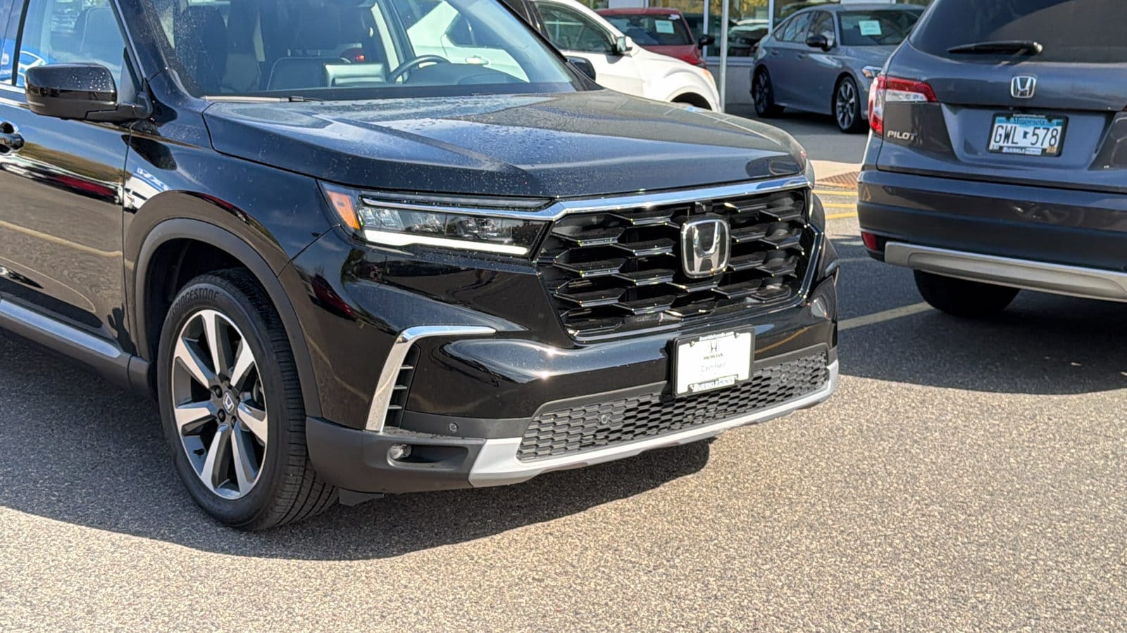 Certified 2024 Honda Pilot Elite with VIN 5FNYG1H81RB048457 for sale in Saint Paul, Minnesota