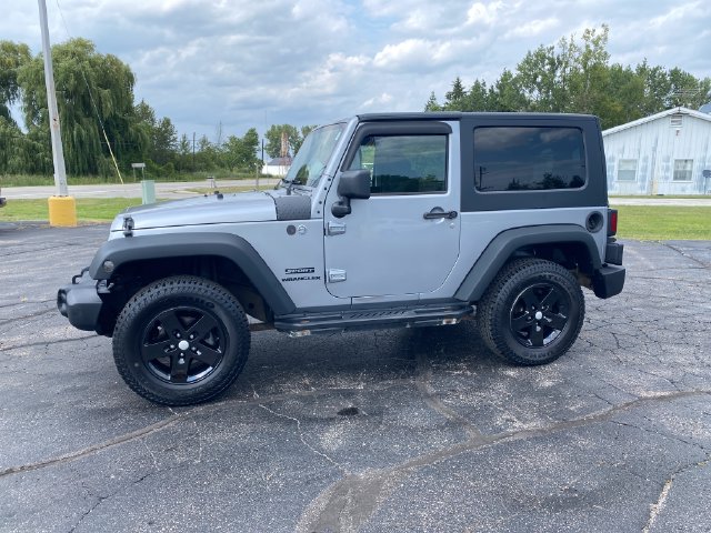 Used 2014 Jeep Wrangler Sport with VIN 1C4AJWAG8EL249717 for sale in Pinconning, MI