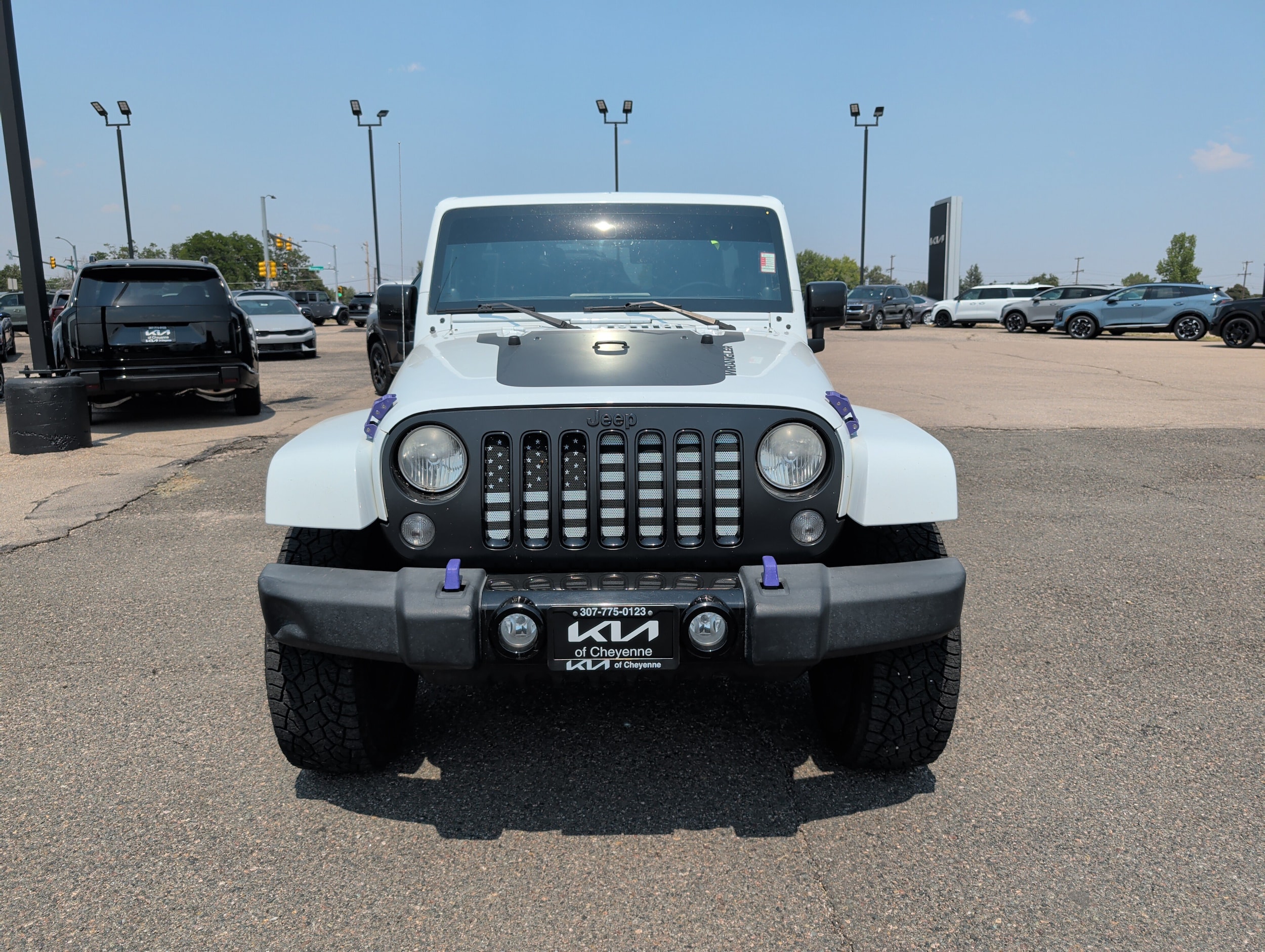 Used 2014 Jeep Wrangler Unlimited Sahara with VIN 1C4BJWEG3EL275933 for sale in Cheyenne, WY