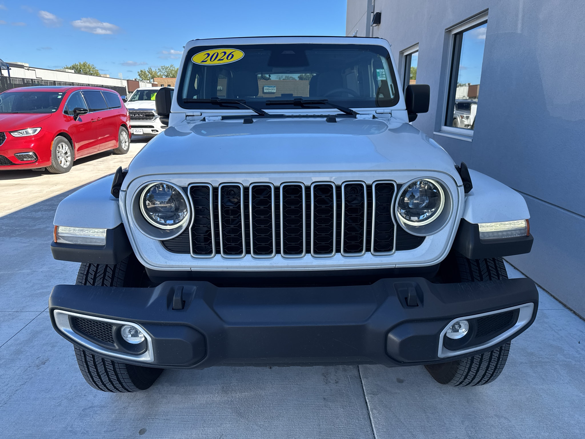 Used 2026 Jeep Wrangler 4-Door Sahara with VIN 1C4PJXEG8TW245933 for sale in Winona, Minnesota
