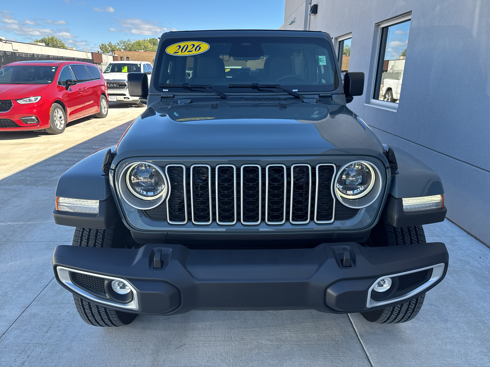 Used 2026 Jeep Wrangler 4-Door Sahara with VIN 1C4PJXEG0TW245487 for sale in Winona, Minnesota