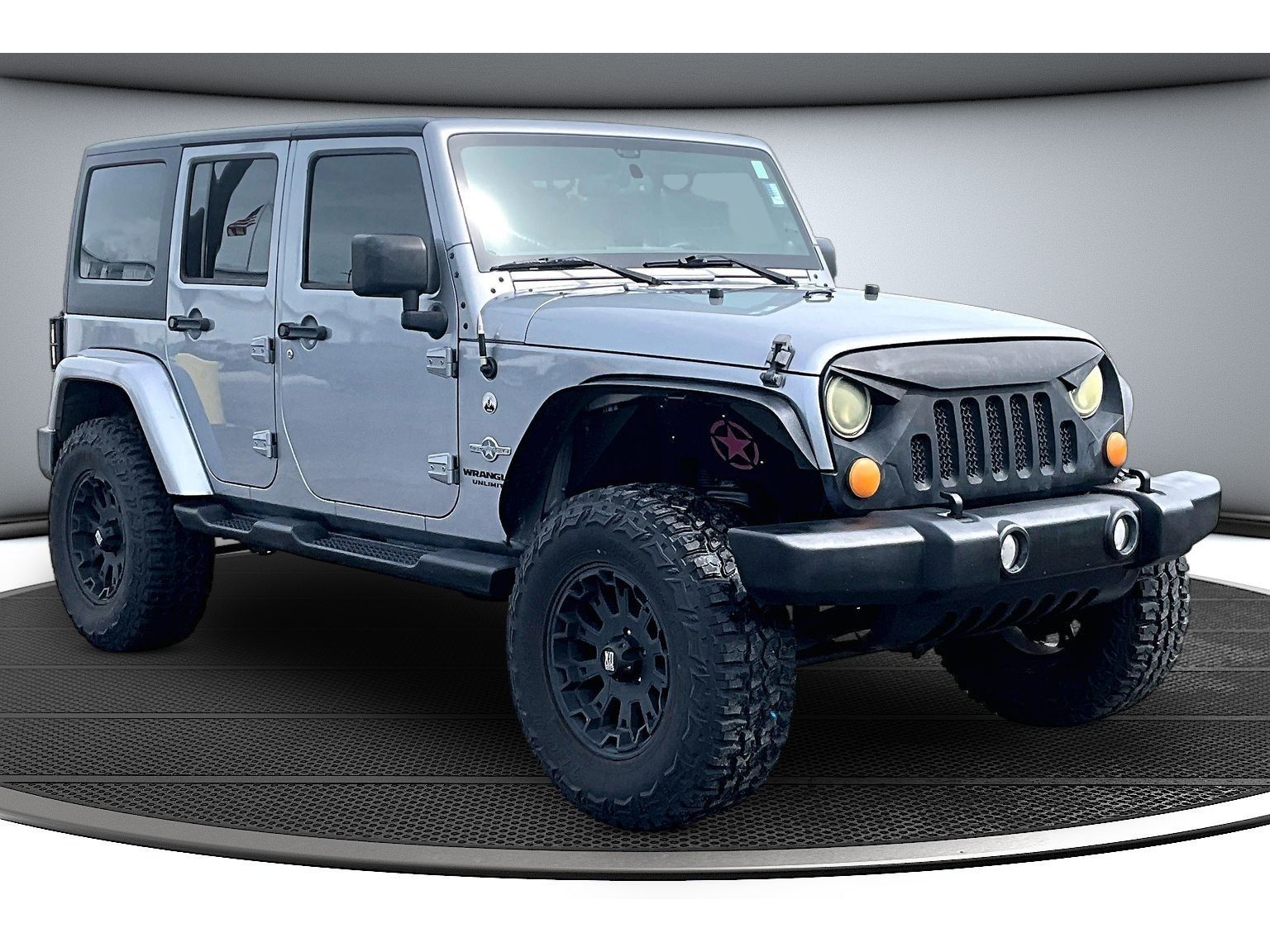 Used 2013 Jeep Wrangler Unlimited Freedom Edition with VIN 1C4HJWDG1DL611458 for sale in Columbia City, IN