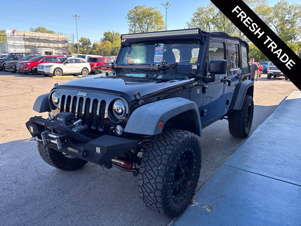 Used 2014 Jeep Wrangler Unlimited Sport