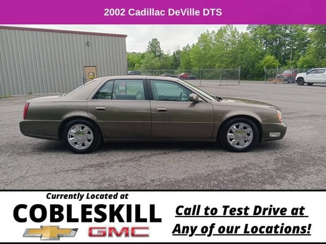 Used 2002 Cadillac DeVille DTS with VIN 1G6KF57952U101557 for sale in Cobleskill, NY