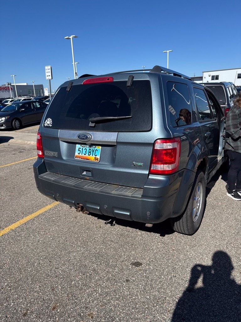 Used 2010 Ford Escape Limited with VIN 1FMCU9EG6AKD27256 for sale in Fargo, ND