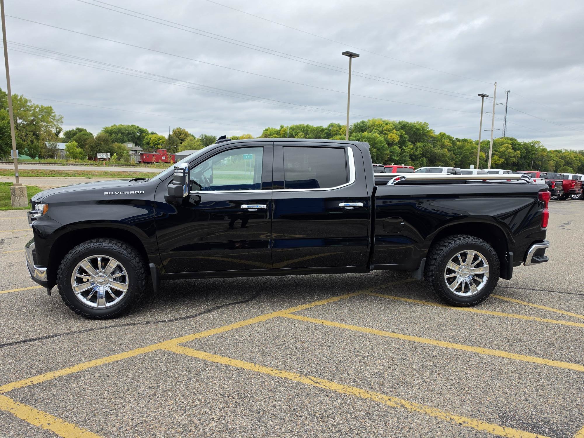 Used 2021 Chevrolet Silverado 1500 LTZ with VIN 1GCUYGEL5MZ221679 for sale in Annandale, Minnesota