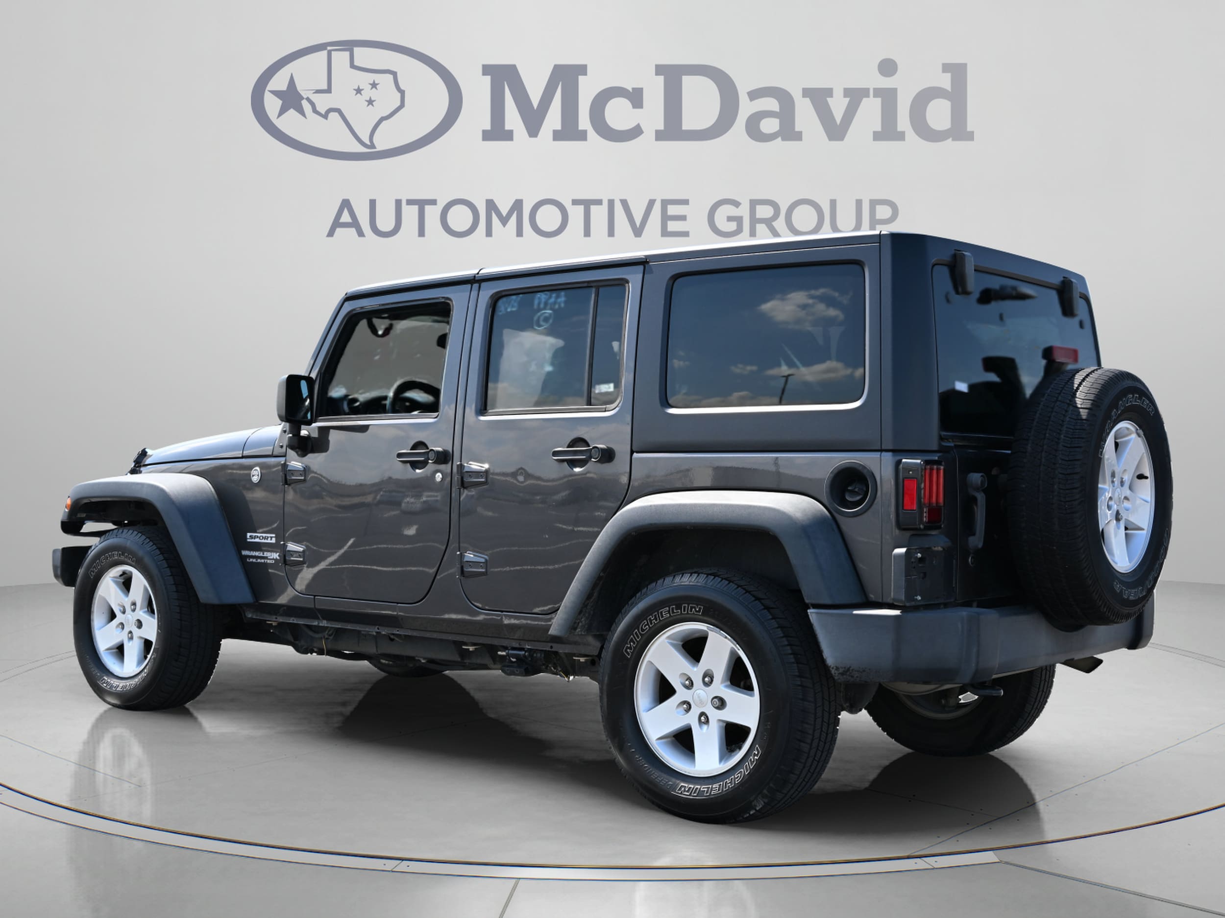 Used 2018 Jeep Wrangler JK Unlimited Sport S with VIN 1C4BJWDG2JL827787 for sale in Irving, TX