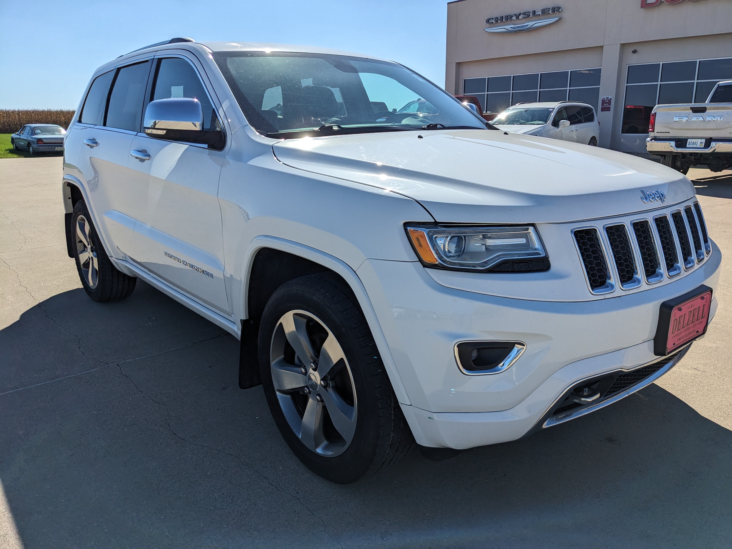 Used 2015 Jeep Grand Cherokee Overland with VIN 1C4RJFCGXFC619566 for sale in Wapello, IA