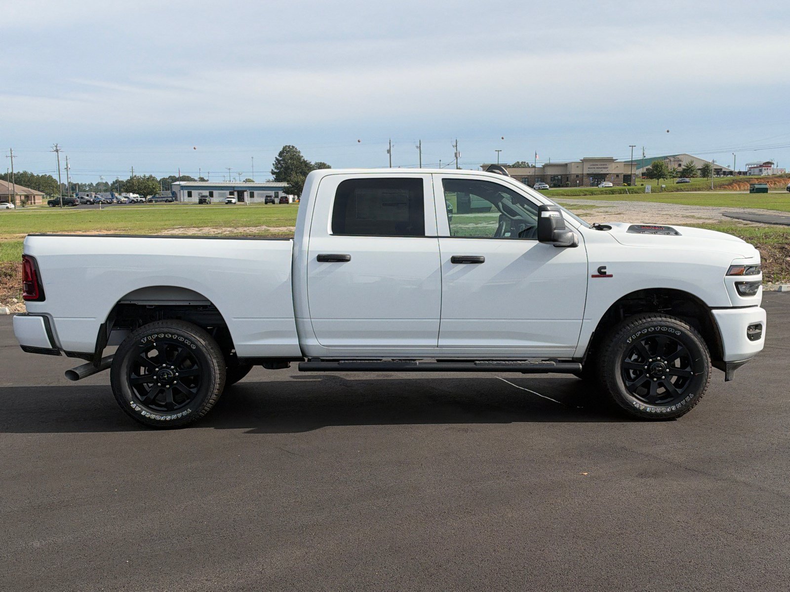 New 2026 Ram 2500 BLACK EXPRESS CREW CAB 4X4 6'4 BOX Pickup