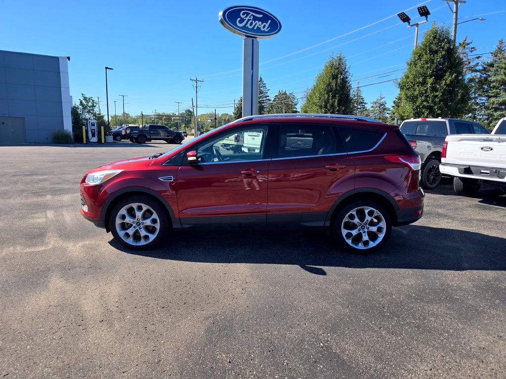 Used 2016 Ford Escape Titanium with VIN 1FMCU9JX2GUA97847 for sale in South Haven, MI