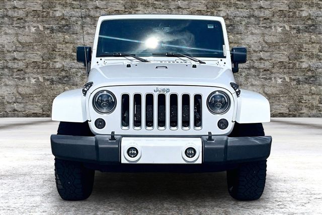 Used 2016 Jeep Wrangler Sahara with VIN 1C4AJWBG1GL124723 for sale in Greenville, MI