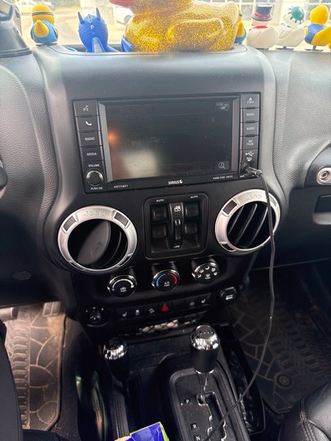 Used 2015 Jeep Wrangler Unlimited Sahara with VIN 1C4BJWEG9FL536533 for sale in Greenville, MI