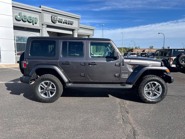 Used 2019 Jeep Wrangler Unlimited Sahara with VIN 1C4HJXEN0KW649259 for sale in Pine City, Minnesota