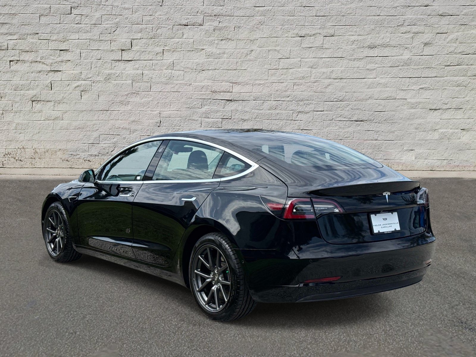 Used 2019 Tesla Model 3 Mid Range with VIN 5YJ3E1EA8KF410121 for sale in Jacksonville, FL