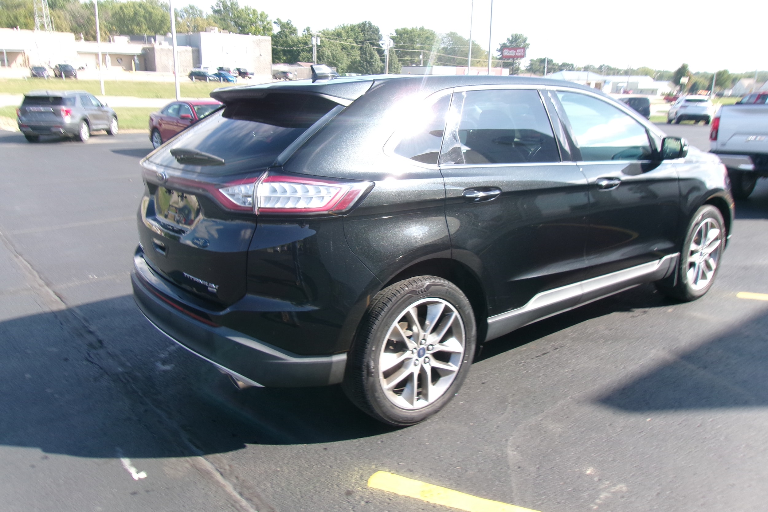 Used 2015 Ford Edge Titanium with VIN 2FMTK4K80FBB12639 for sale in Holton, KS