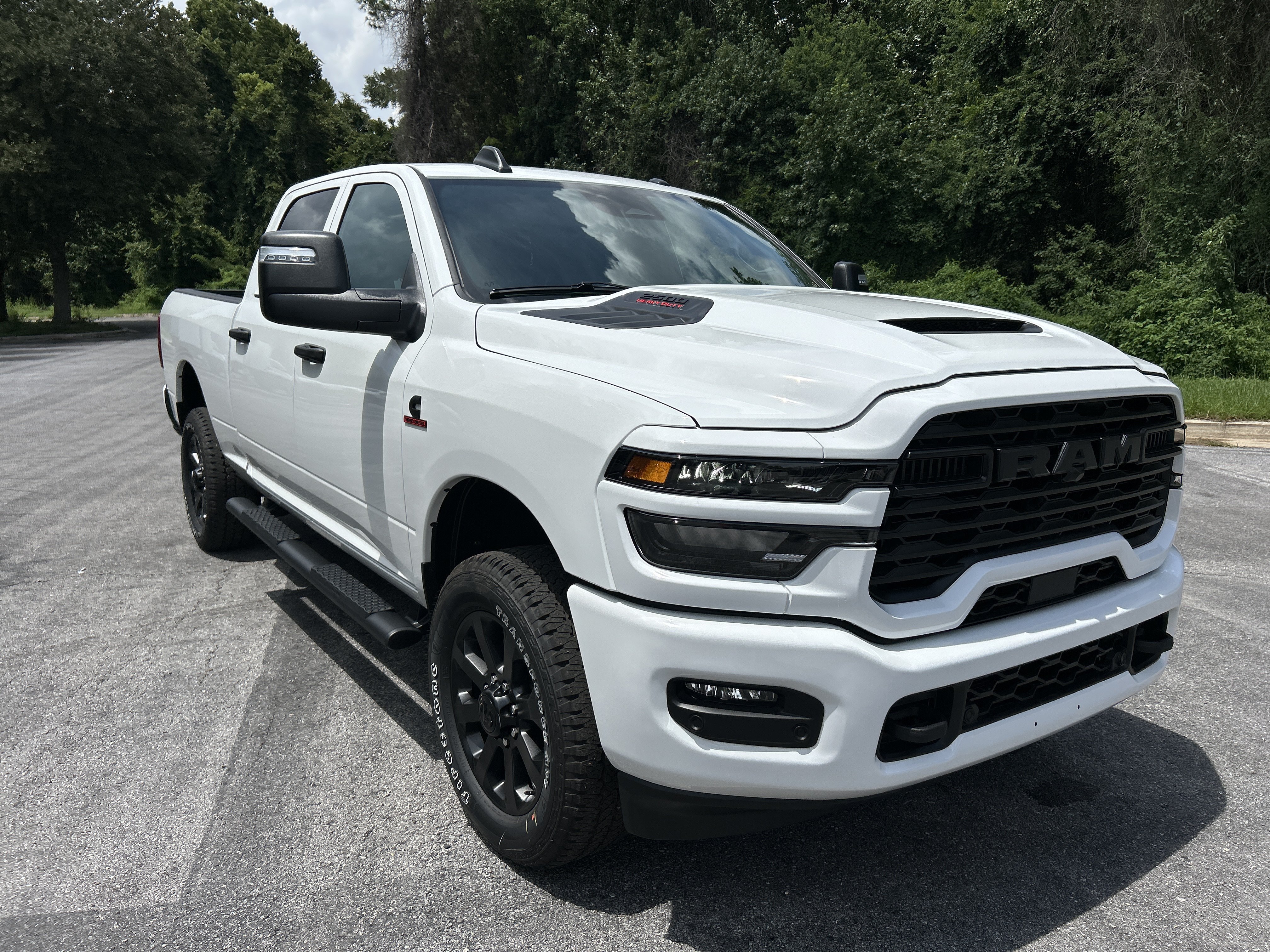 New 2026 Ram 2500 BLACK EXPRESS CREW CAB 4X4 6'4 BOX Pickup