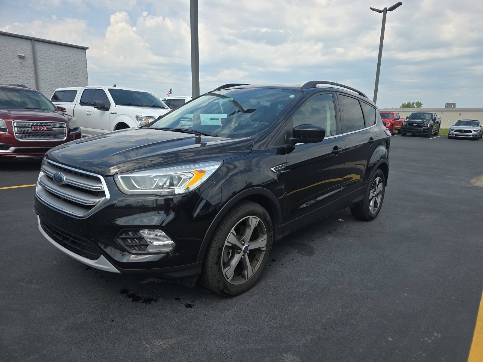 Used 2017 Ford Escape SE with VIN 1FMCU9G97HUA22006 for sale in Bay City, MI