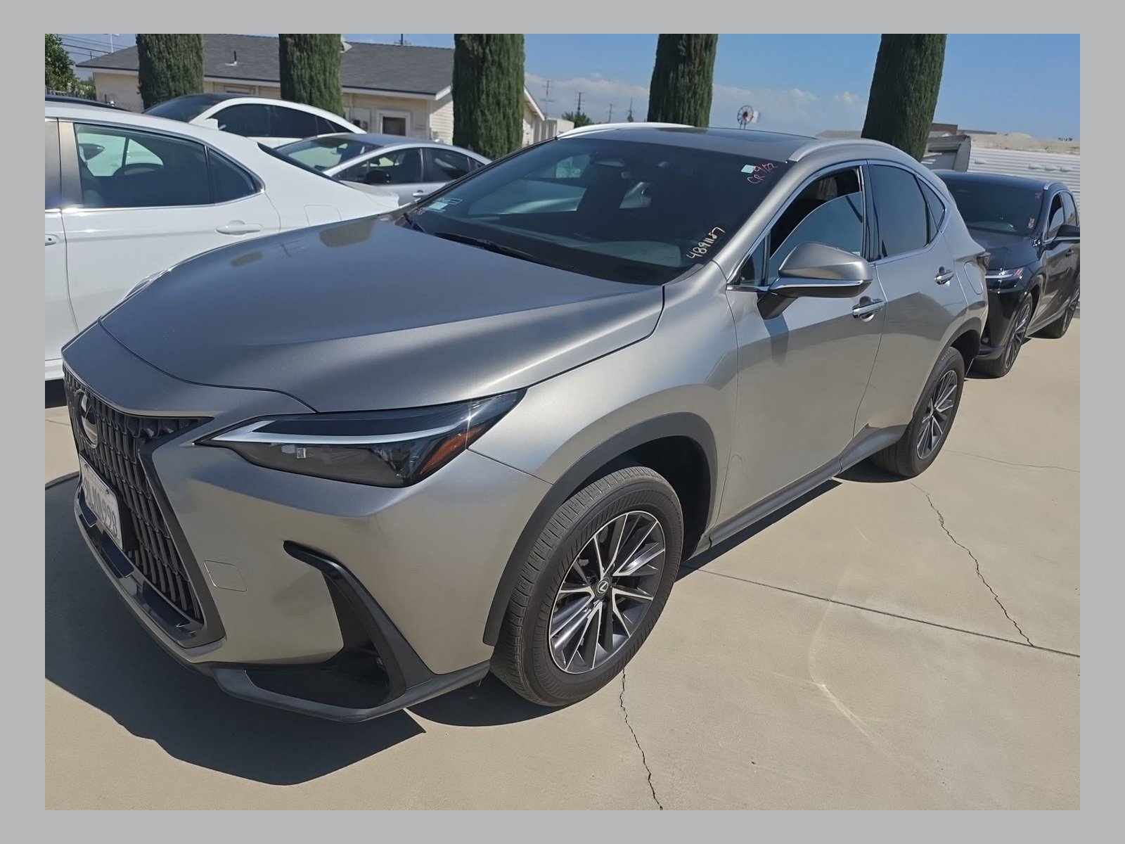 Used 2024 Lexus NX Premium Package/Black/Rich Cream NuLuxe® and Stippled Black trim/2,000-lb towing capacity/Rain-sensing windshield wipers SUV
