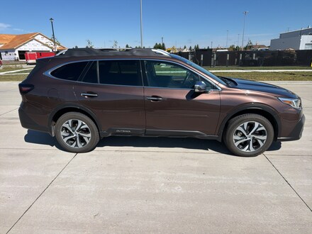 Featured used cars, trucks, and SUVs 2021 Subaru Outback Touring SUV for sale near you in Grand Forks, ND