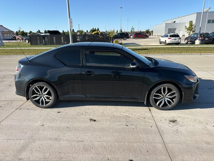Featured used cars, trucks, and SUVs 2015 Scion tC Base Coupe for sale near you in Grand Forks, ND