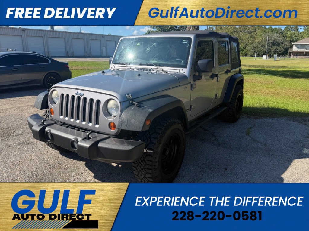 Used 2013 Jeep Wrangler Unlimited Sport SUV