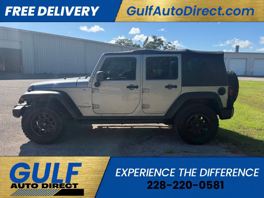 Used 2013 Jeep Wrangler Unlimited Sport SUV