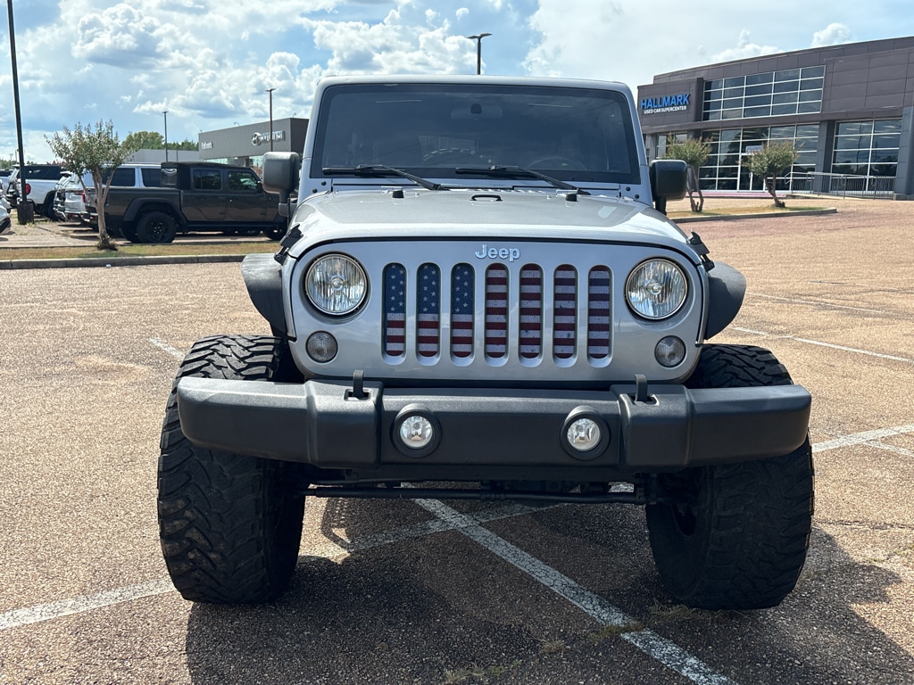 Used 2016 Jeep Wrangler Unlimited Sport with VIN 1C4BJWDG7GL144685 for sale in Flowood, MS