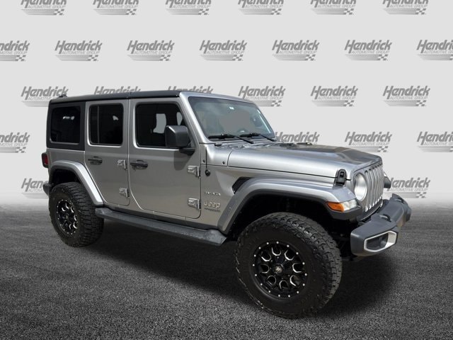 Used 2020 Jeep Wrangler Unlimited Sahara with VIN 1C4HJXEN0LW130777 for sale in Kansas City