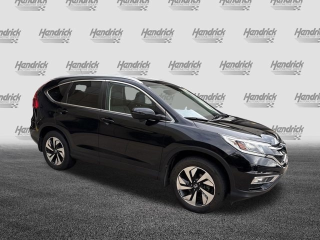 Used 2016 Honda CR-V Touring with VIN 5J6RM4H99GL021650 for sale in Kansas City
