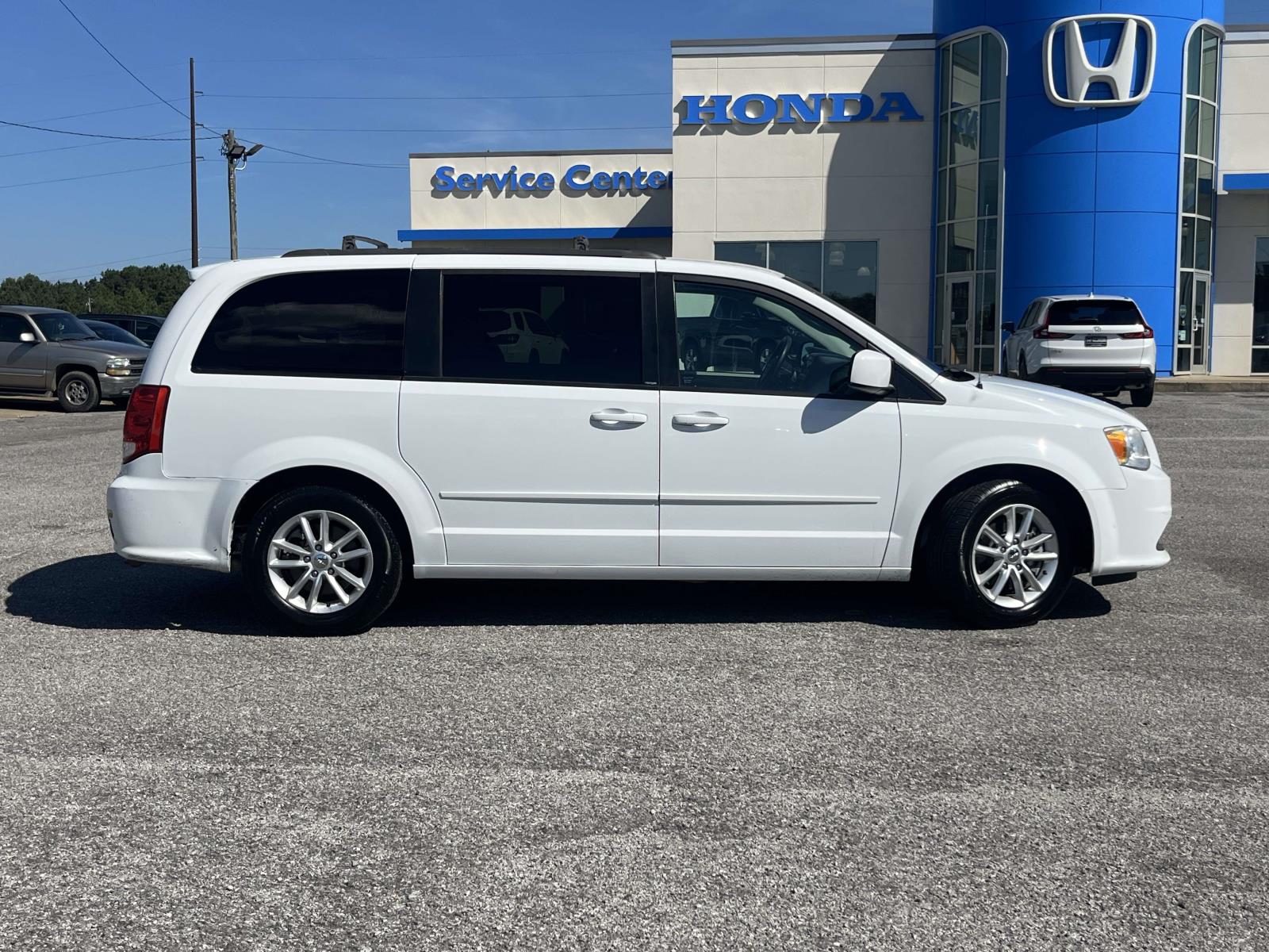 Used 2014 Dodge Grand Caravan SXT with VIN 2C4RDGCG0ER291061 for sale in Jasper, AL
