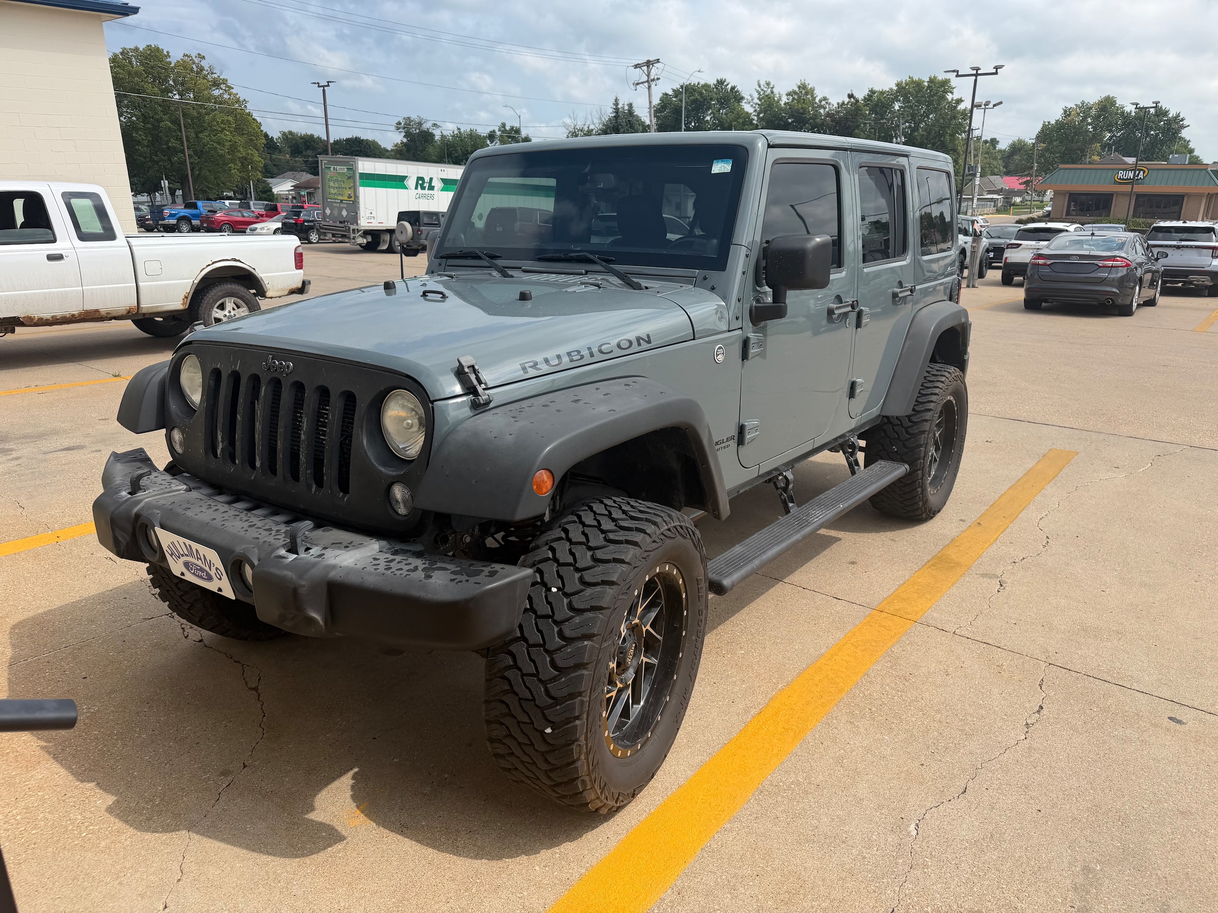 Used 2014 Jeep Wrangler Unlimited Rubicon with VIN 1C4BJWFG1EL135572 for sale in Kansas City