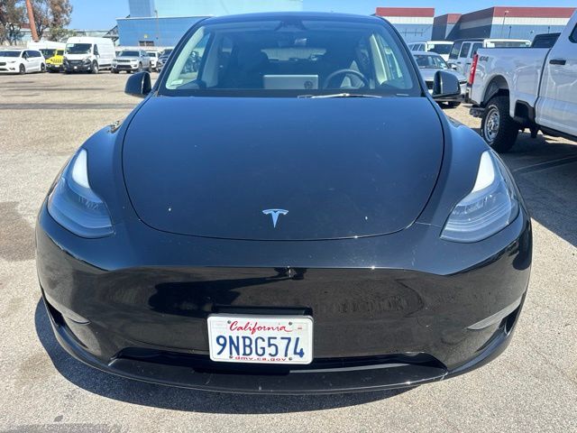 Used 2024 Tesla Model Y Long Range with VIN 7SAYGDED8RF124567 for sale in Huntington Beach, CA