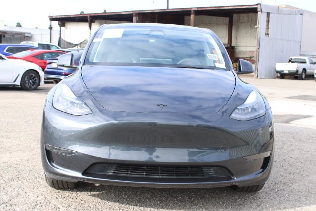 Used 2024 Tesla Model Y Long Range with VIN 7SAYGDED8RF051944 for sale in Huntington Beach, CA