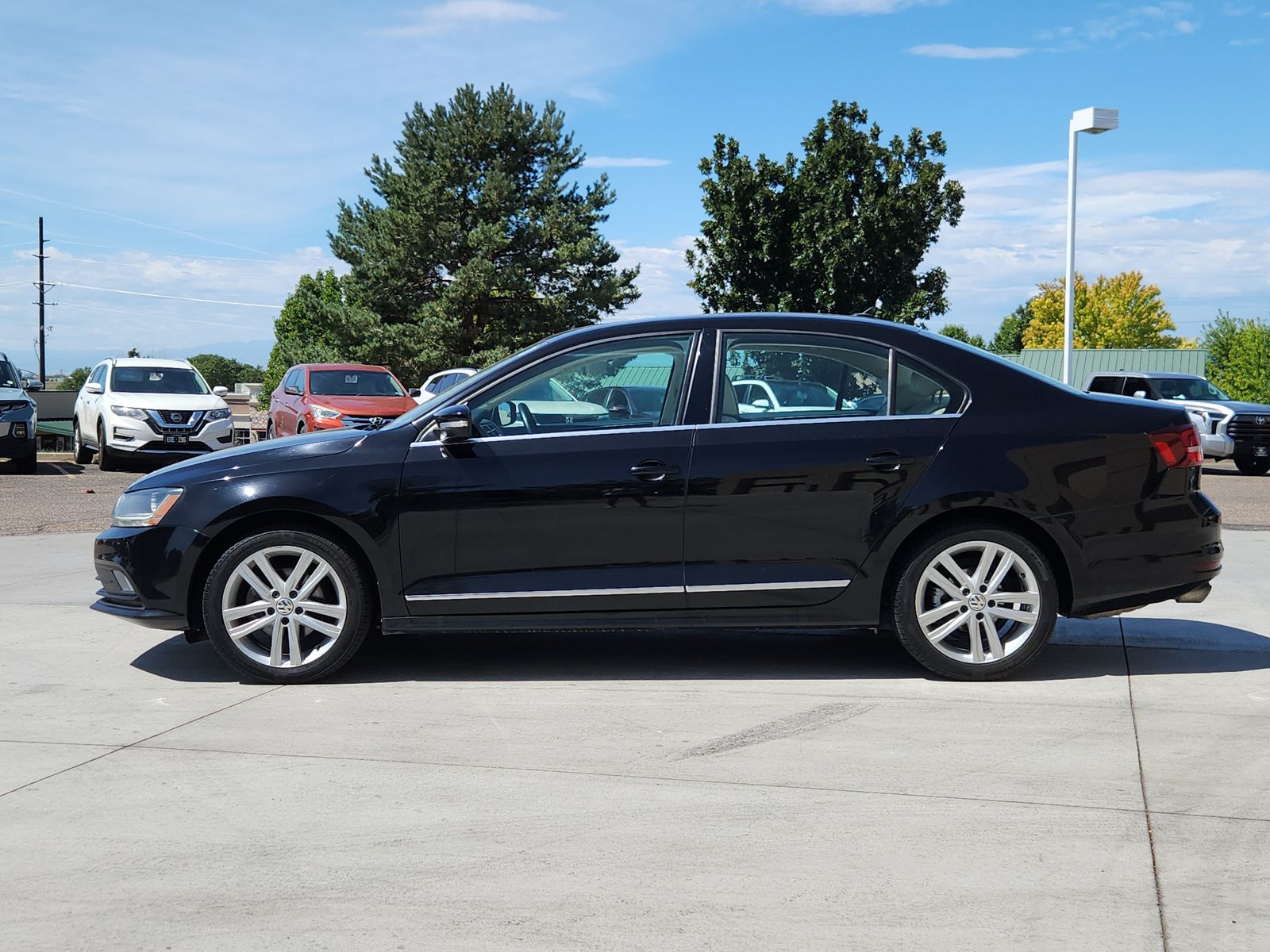Used 2017 Volkswagen Jetta SEL with VIN 3VWL17AJ1HM394527 for sale in Greeley, CO