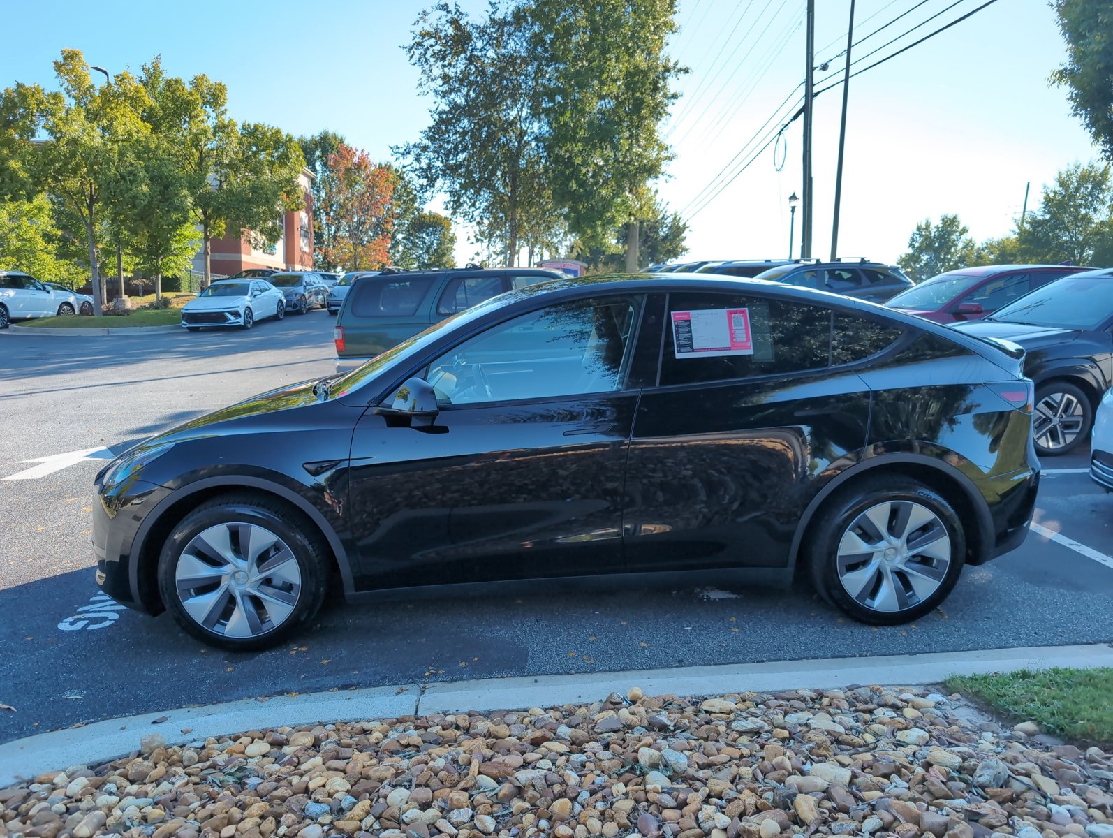 Used 2024 Tesla Model Y Long Range Sport Utility