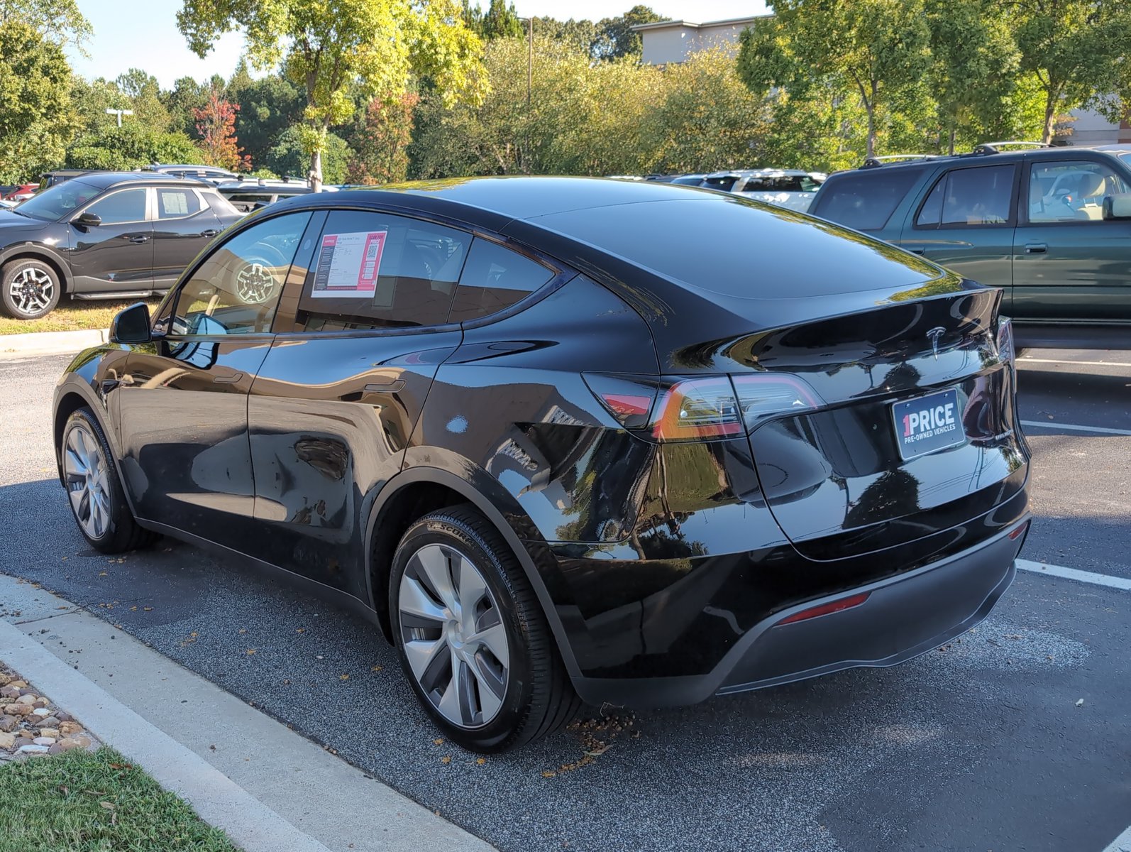 Used 2024 Tesla Model Y Long Range Sport Utility