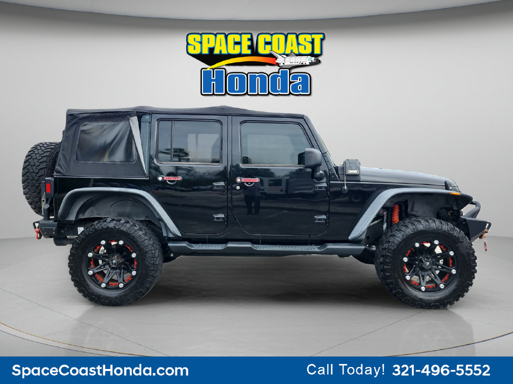 Used 2013 Jeep Wrangler Unlimited Sahara SUV