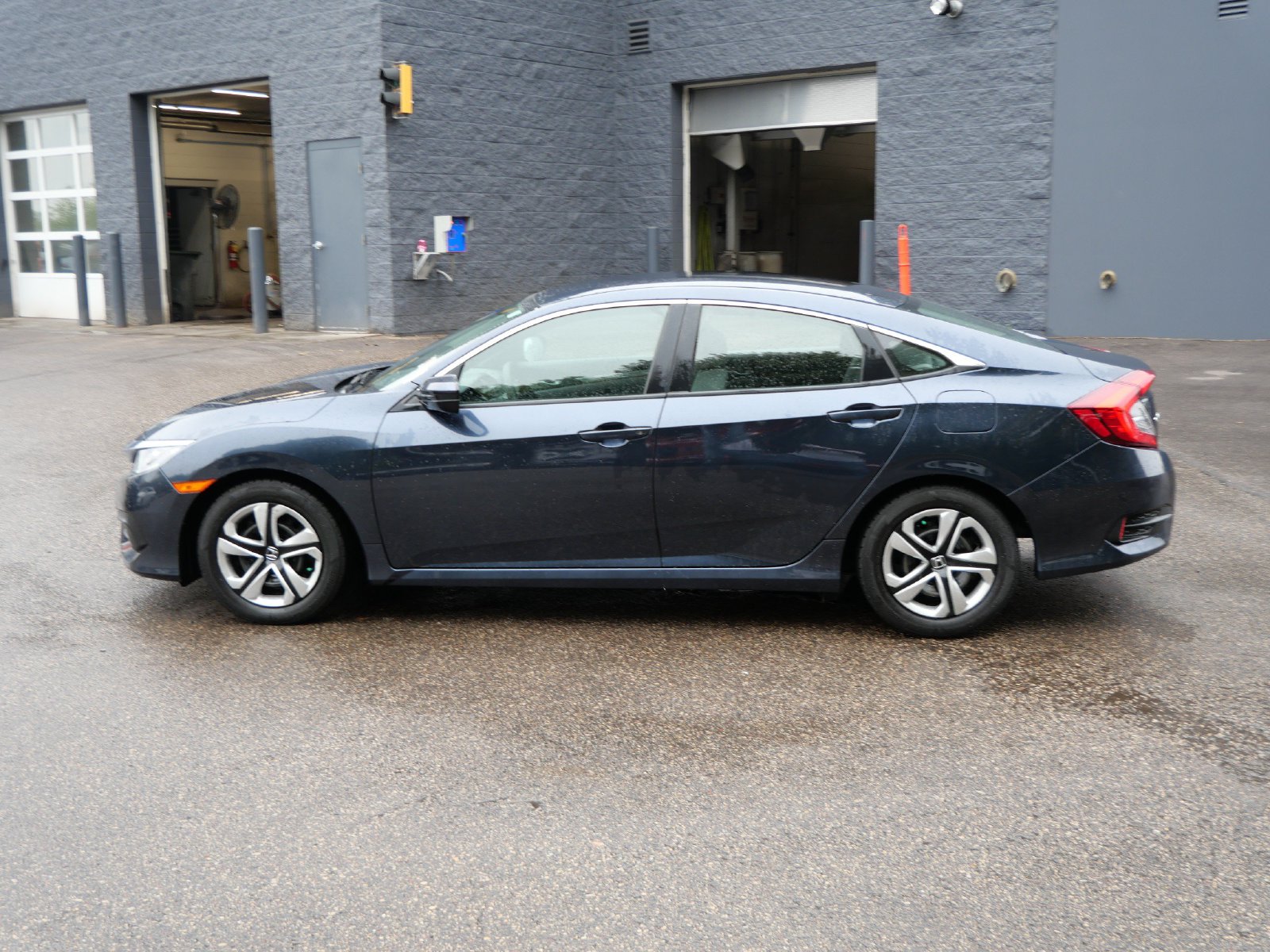Used 2018 Honda Civic LX with VIN 19XFC2F53JE010224 for sale in Maplewood, Minnesota