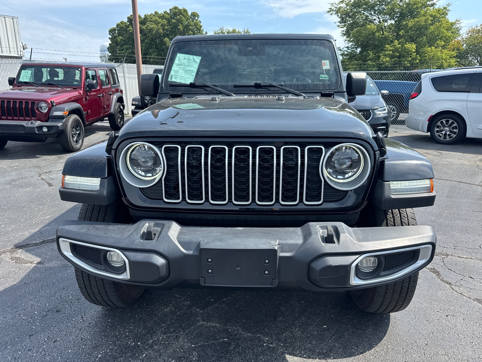 Used 2024 Jeep Wrangler 4-Door Sahara with VIN 1C4PJXENXRW257962 for sale in Kansas City