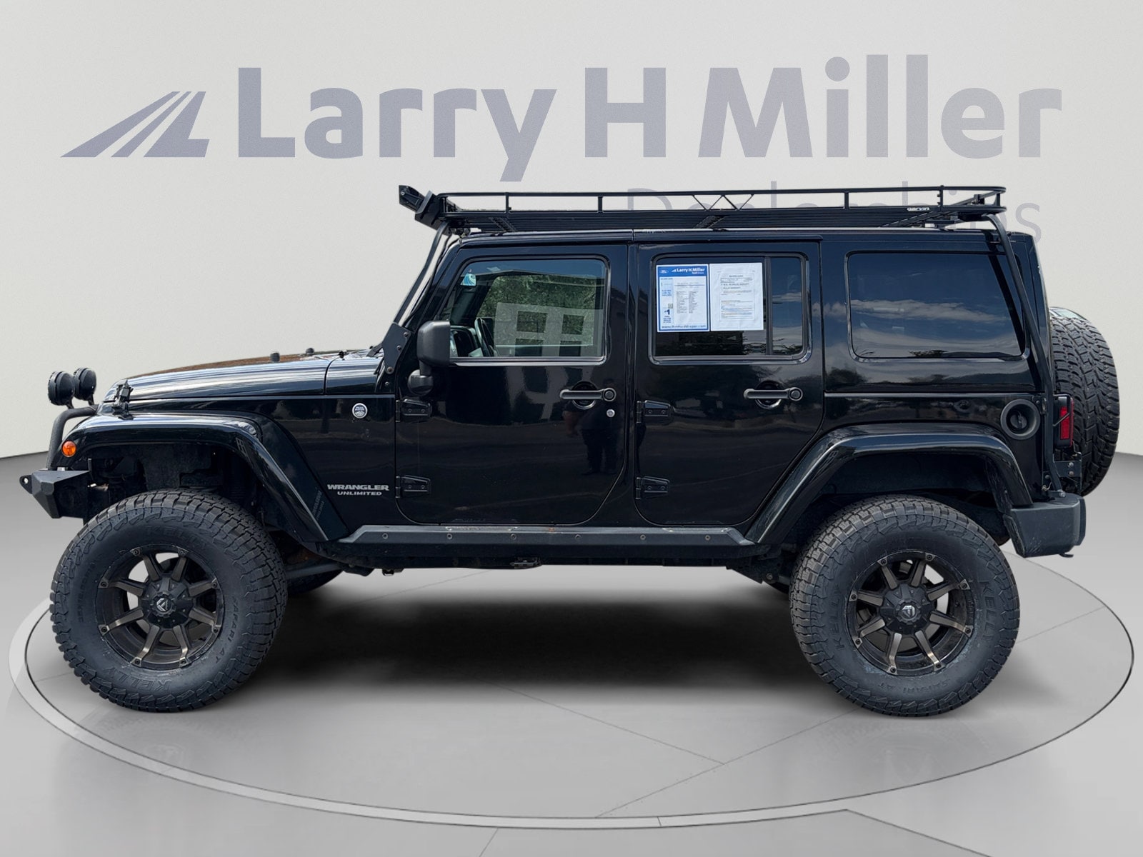 Used 2014 Jeep Wrangler Unlimited Rubicon with VIN 1C4HJWFG8EL164139 for sale in Draper, UT