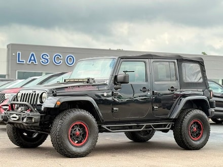 Featured used 2016 Jeep Wrangler Unlimited Rubicon SUV 1C4BJWFG6GL348973 for sale in Fenton, MI