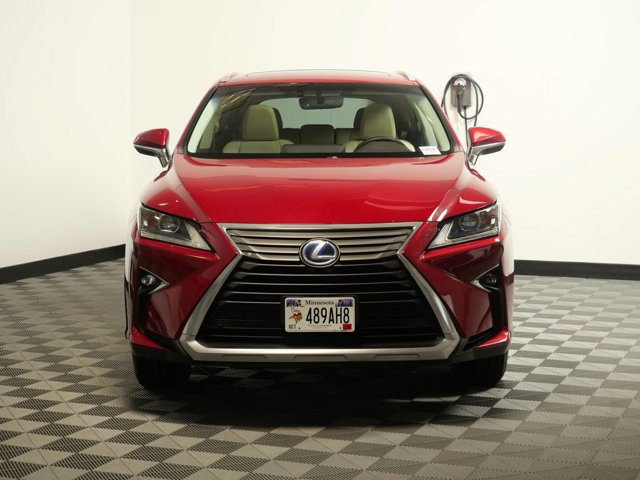Used 2016 Lexus RX 450h with VIN 2T2BGMCA6GC001696 for sale in Maplewood, Minnesota