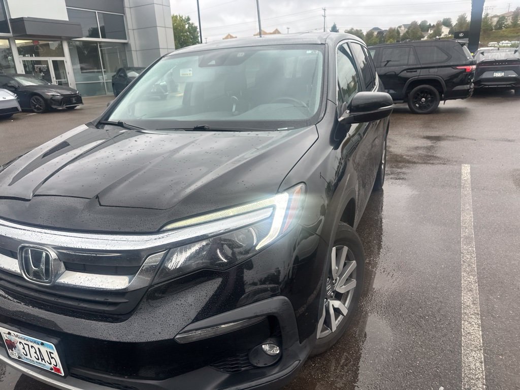 Used 2021 Honda Pilot EX-L with VIN 5FNYF6H52MB044254 for sale in Maplewood, Minnesota