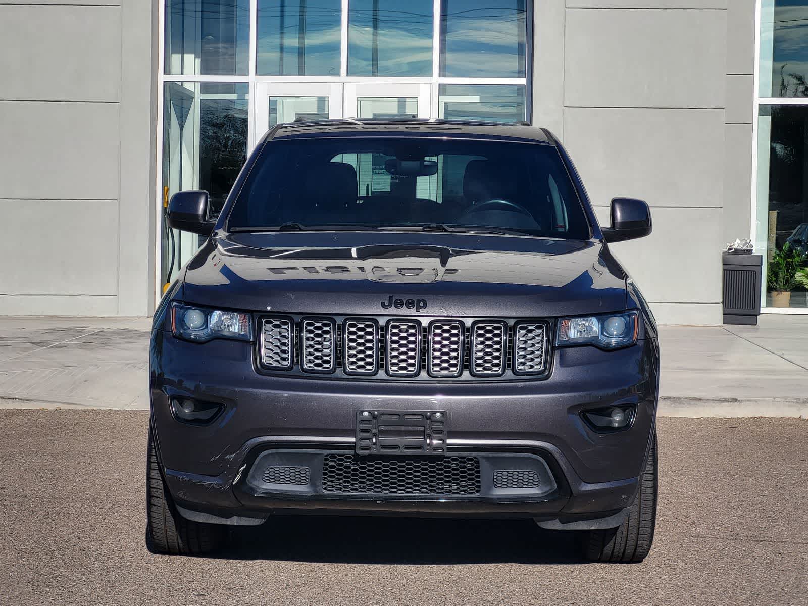 Used 2017 Jeep Grand Cherokee Altitude with VIN 1C4RJFAG4HC911008 for sale in Santa Fe, NM